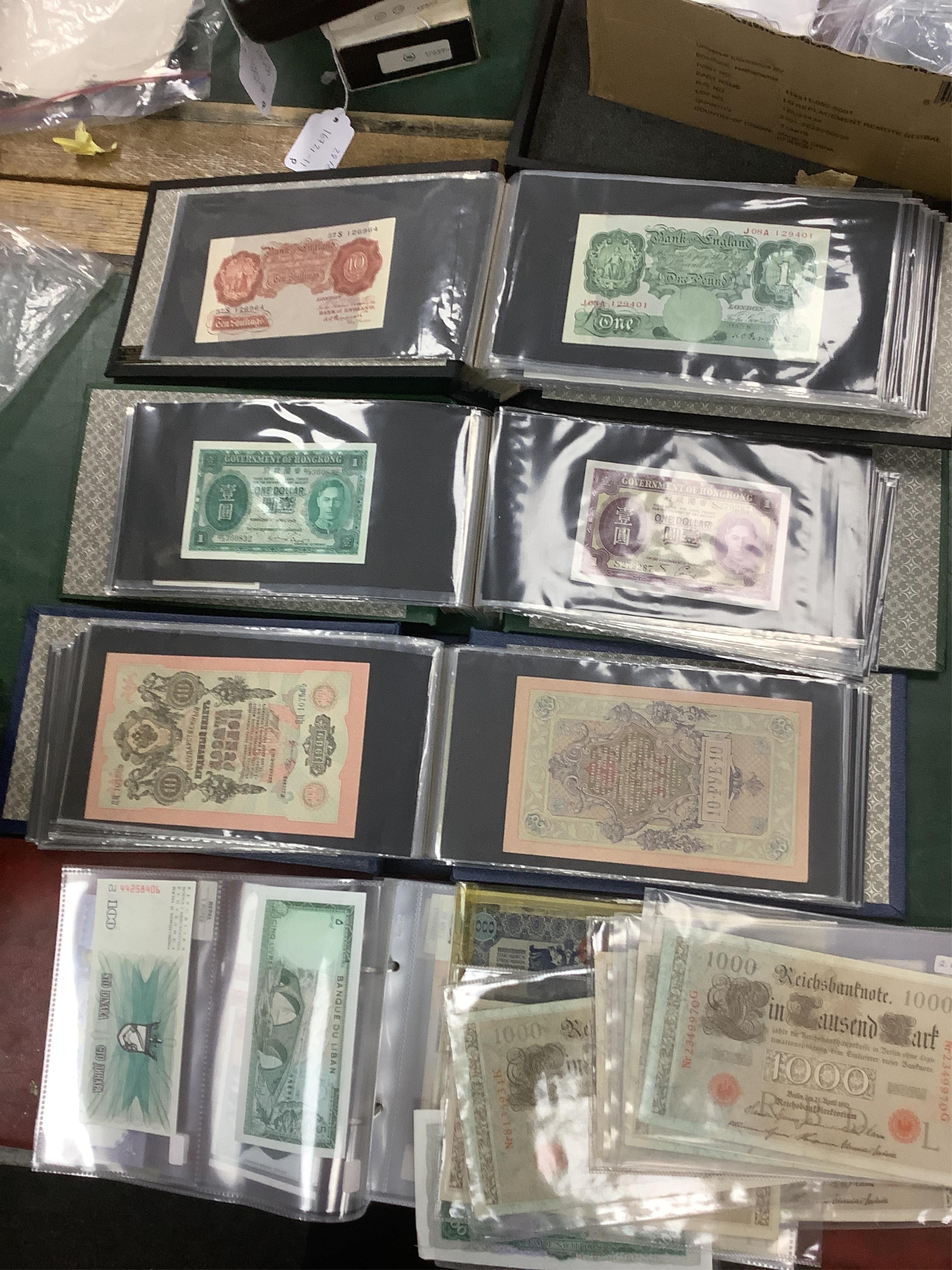 A large collection of World Banknotes, in five albums, to include Central Bank of China Republic period banknotes, UK, George V to QEII, mostly mint unused